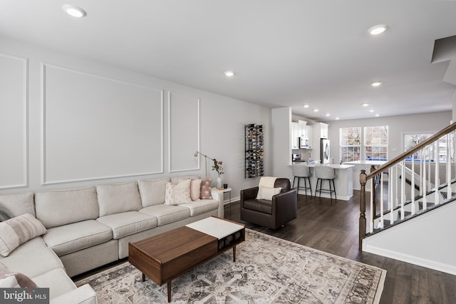 living room featuring dark hardwood / wood-style floors