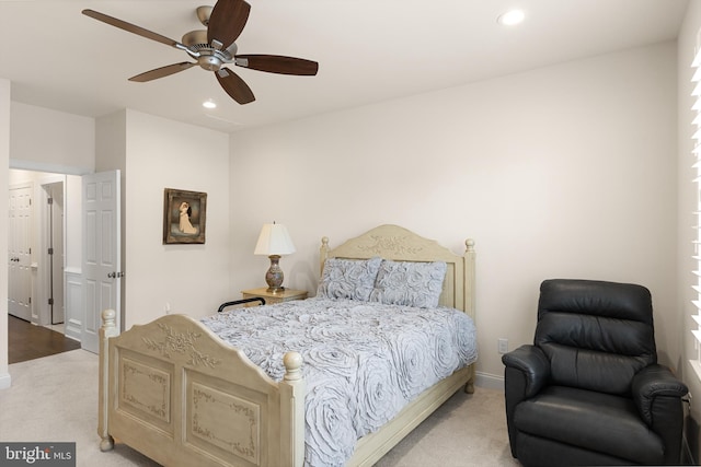 carpeted bedroom featuring ceiling fan