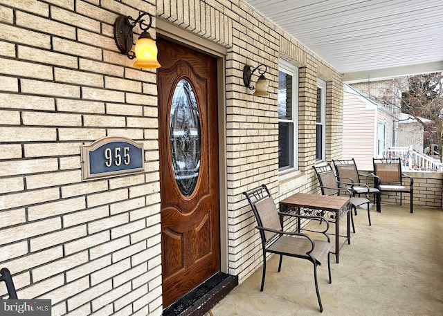 property entrance with a porch