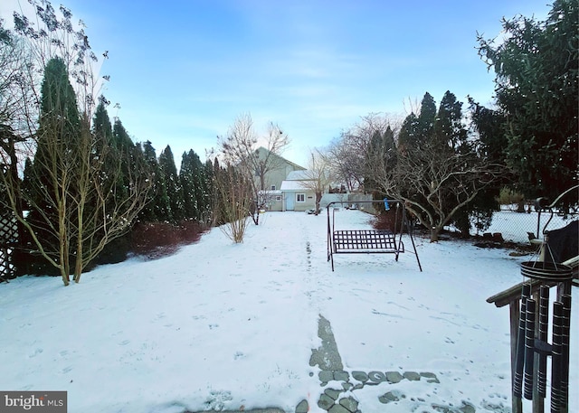 view of yard covered in snow