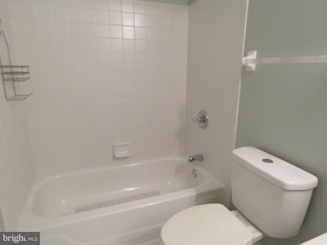 bathroom with toilet and shower / bath combination