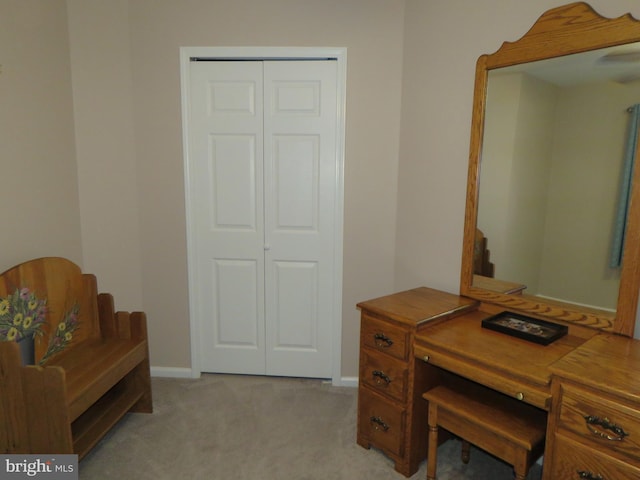 home office with light colored carpet