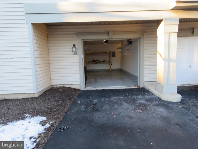 property entrance with a garage