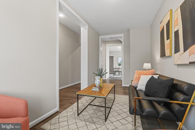 sitting room featuring hardwood / wood-style floors