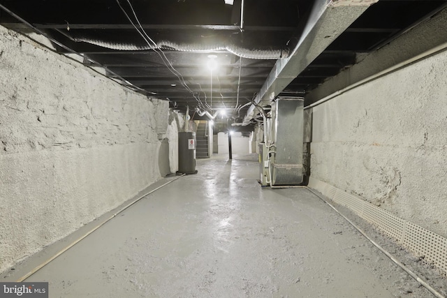 basement with heating unit and water heater