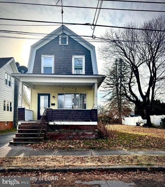 view of front of property with a porch