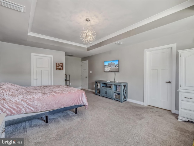 carpeted bedroom with crown molding, a raised ceiling, and a notable chandelier