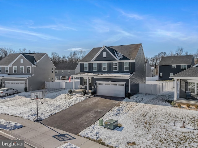 front of property with a garage