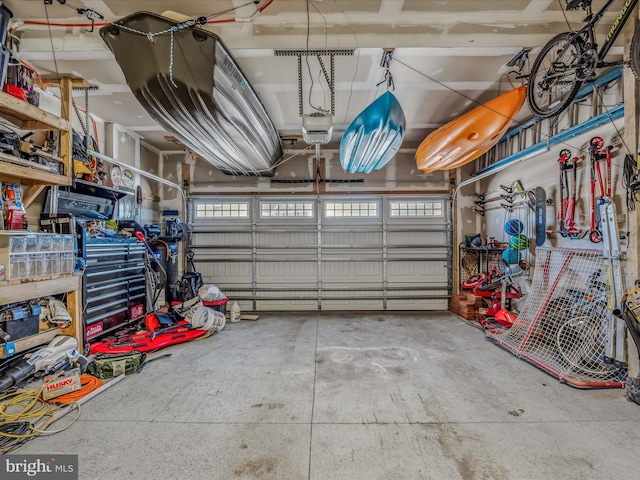 garage featuring a garage door opener