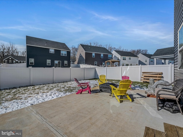 view of patio featuring an outdoor fire pit