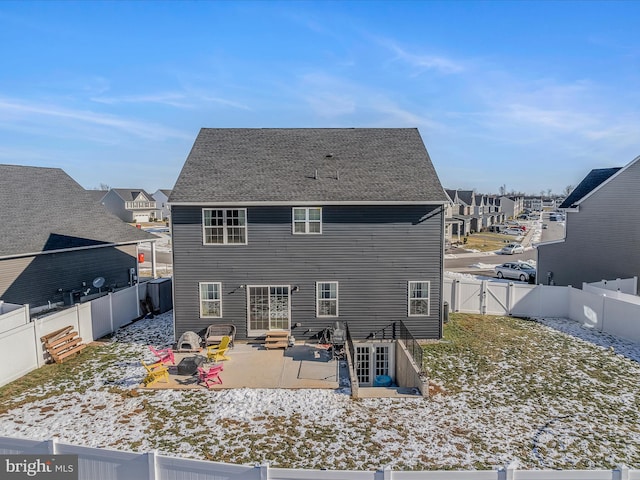 rear view of house featuring a patio