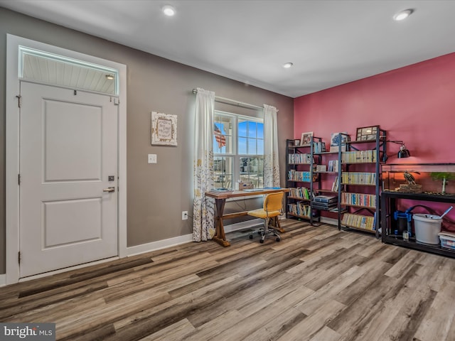 office space with hardwood / wood-style floors