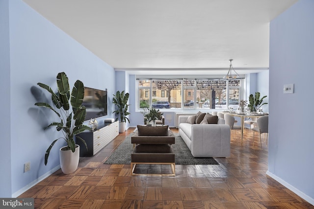 living room with dark parquet flooring