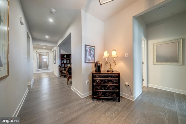 hallway featuring hardwood / wood-style flooring