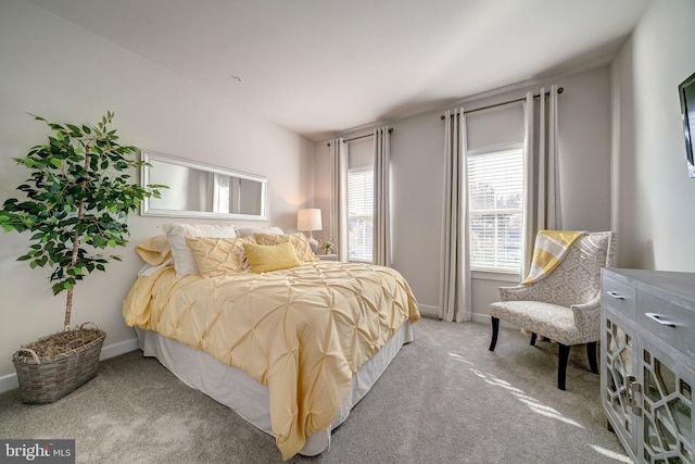 bedroom with light carpet