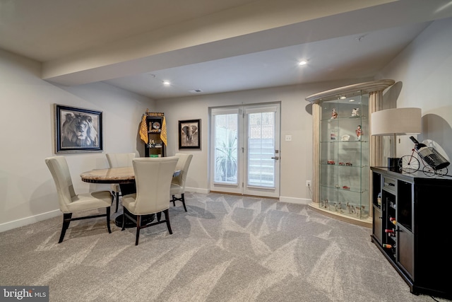 dining space with carpet floors