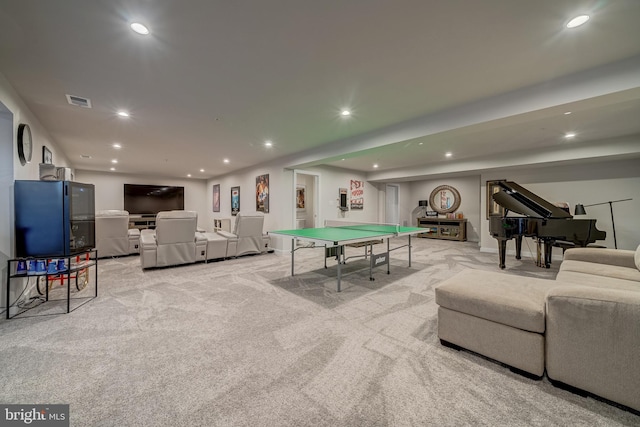 game room featuring light colored carpet