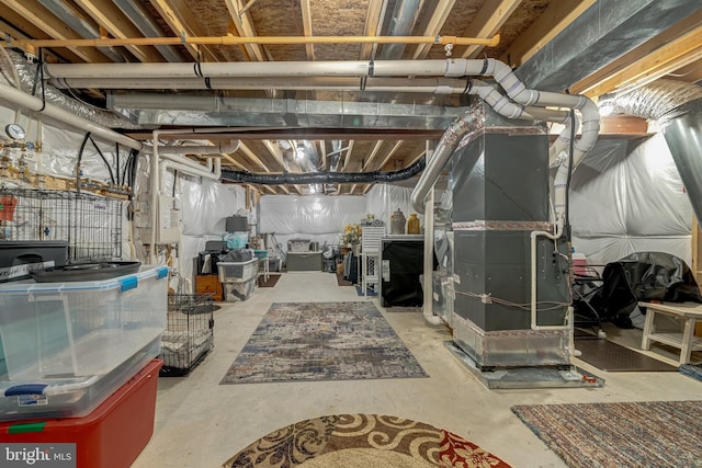 basement featuring heating unit