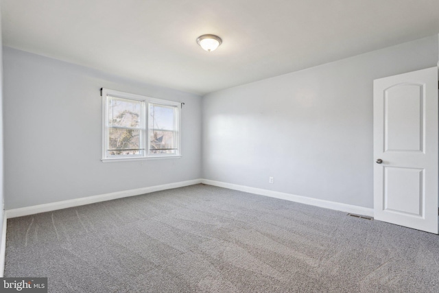 empty room featuring carpet