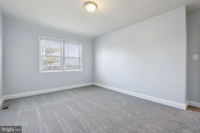 view of carpeted spare room