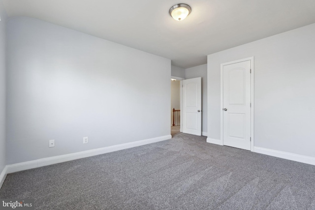 unfurnished room with carpet