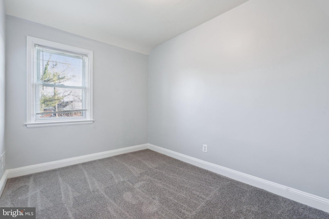 view of carpeted spare room