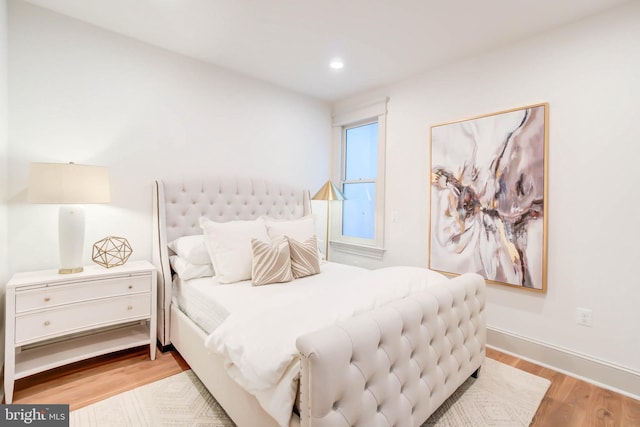 bedroom featuring light hardwood / wood-style floors