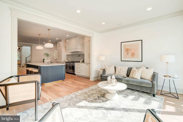 living room with light hardwood / wood-style flooring