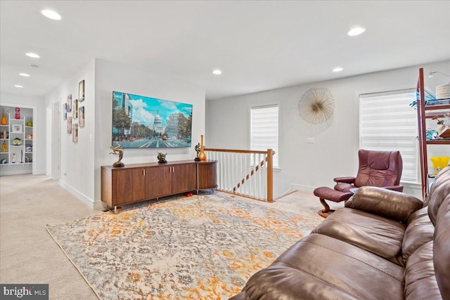 living room featuring light colored carpet