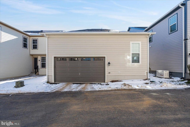 exterior space with a garage