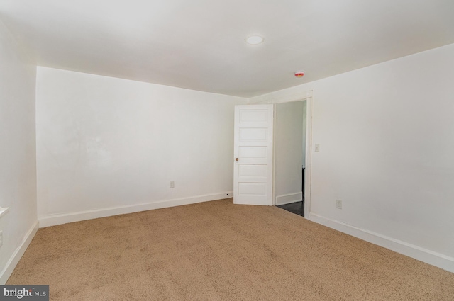 empty room featuring carpet floors