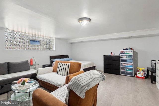 bedroom with light hardwood / wood-style floors