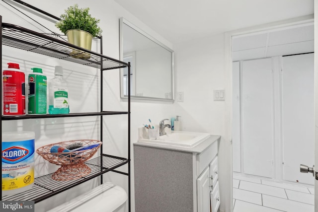 bathroom featuring vanity and tile patterned flooring