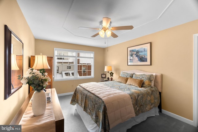 bedroom featuring ceiling fan and carpet floors