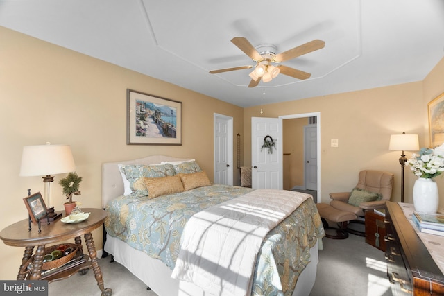 carpeted bedroom with ceiling fan