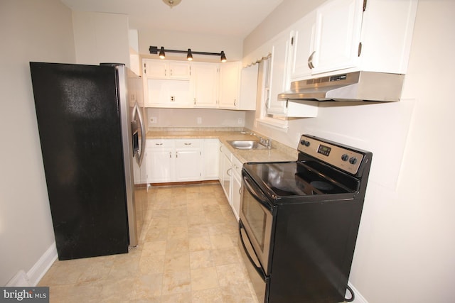 kitchen featuring under cabinet range hood, a sink, white cabinetry, stainless steel appliances, and light countertops