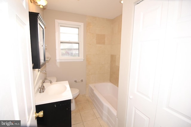 bathroom featuring tile patterned floors, toilet, and vanity