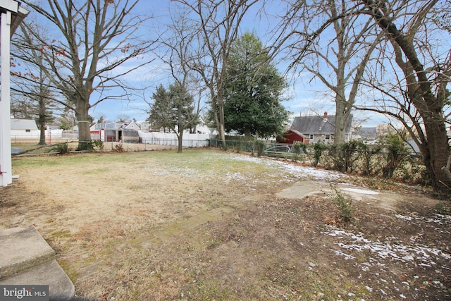 view of yard with fence