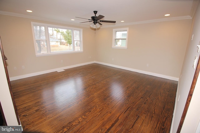 unfurnished room featuring dark wood-type flooring, recessed lighting, baseboards, and ornamental molding