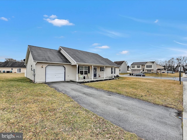 single story home with a garage, aphalt driveway, roof with shingles, covered porch, and a front yard