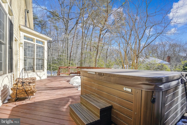 deck with a hot tub