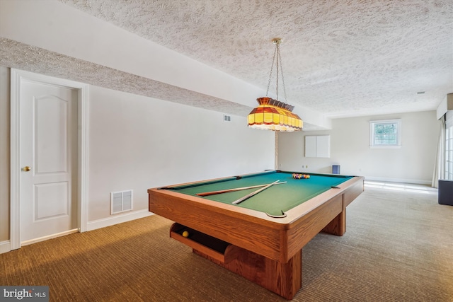 recreation room featuring carpet flooring, pool table, and a textured ceiling