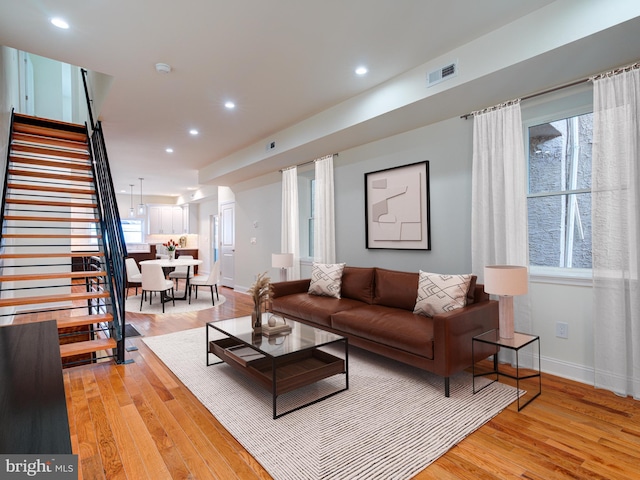 living room featuring light wood-type flooring