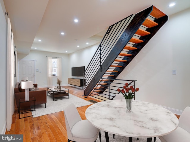 dining area with light wood-type flooring