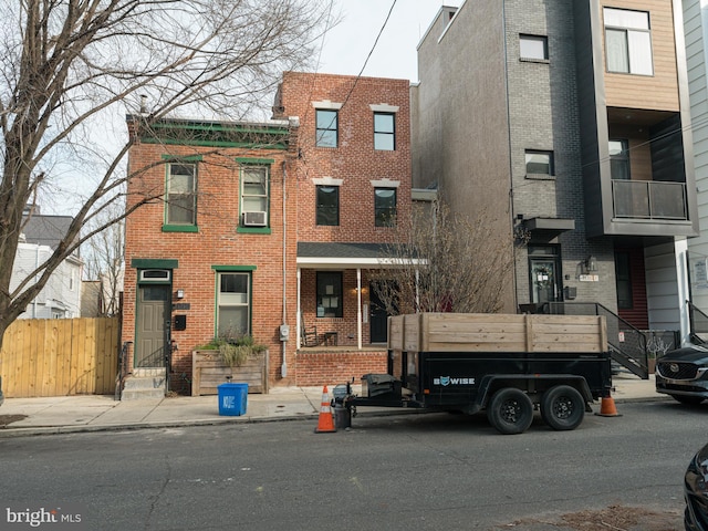 view of front facade with cooling unit