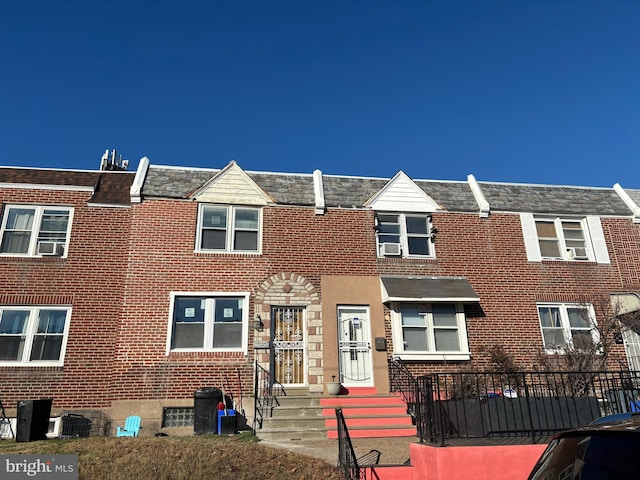 view of property with central AC unit