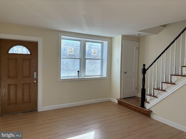 entryway with light hardwood / wood-style flooring