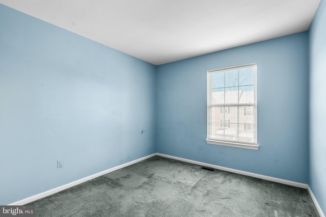 view of carpeted spare room