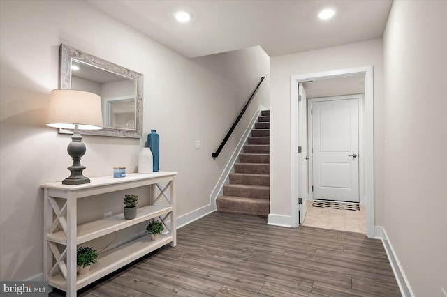 entrance foyer with hardwood / wood-style floors