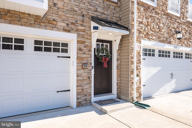 property entrance featuring a garage